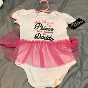 Baby onesie with tutu.